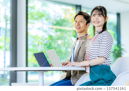 Business scene using a computer in the office Business scene using a computer in the office 137541161