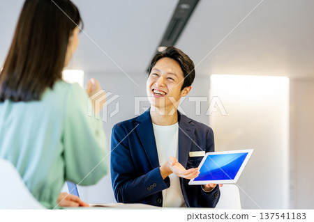 Businessmen having a meeting Businessmen having a meeting 137541183