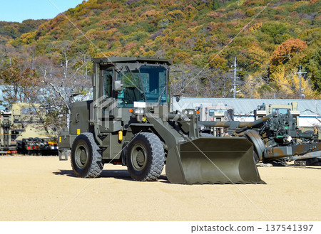 Japan Ground Self-Defense Force bucket loader on display Japan Ground Self-Defense Force bucket loader on display 137541397