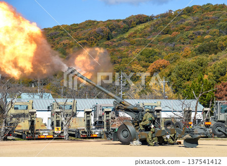 The moment the Japan Ground Self-Defense Force's 155mm howitzer FH-70 fires 137541412