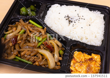 Delicious stir-fried pork and pickled greens Chinese lunch box 137541511