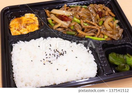 Delicious stir-fried pork and pickled greens Chinese lunch box 137541512