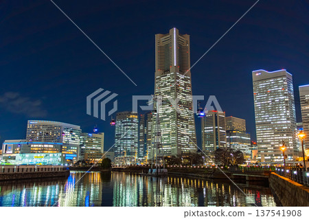 Yokohama, Kanagawa Prefecture: A futuristic night view of Minato Mirai from the Kishamichi area, where a ropeway crosses over the canal Yokohama, Kanagawa Prefecture: A futuristic night view of Minato Mirai from the Kishamichi area, where a ropeway crosses over the canal 137541908