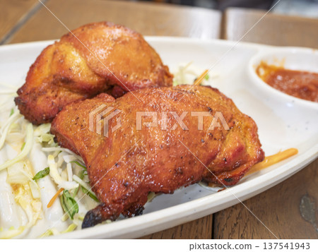 Juicy chicken tikka with the aroma of authentic spices 137541943