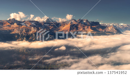 Panoramic aerial view of the Swiss Alps with snow-capped peaks Panoramic aerial view of the Swiss Alps with snow-capped peaks 137541952