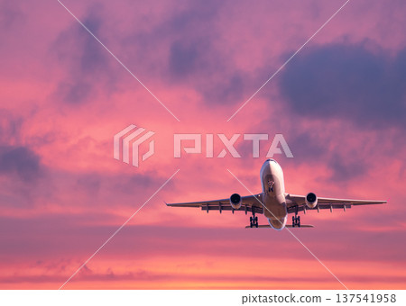 Commercial passenger airplane taking off. Aircraft at sunset Commercial passenger airplane taking off. Aircraft at sunset 137541958