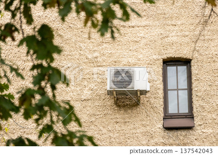 air conditioning on facade of building, air cooling in hot weather.  137542043