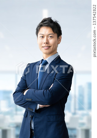 Male businessman folding his arms Male businessman folding his arms 137542822