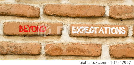Beyond expectations words symbol. Concept words Beyond expectations on beautiful brick wall. Beautiful brick wall background. Business and Beyond expectations words concept. Copy space. 137542997