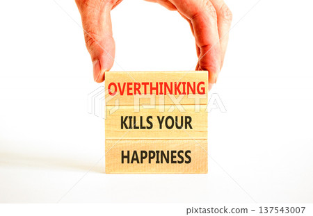 Overthinking kills your happiness symbol. Concept words Overthinking kills your happiness on wooden blocks. Beautiful white background. Business overthinking kills happiness concept. Copy space. 137543007