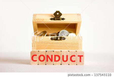 Conduct symbol. Concept word Conduct on beautiful wooden blocks. Beautiful white background. Beautiful wooden chest with coins. Business conduct concept. Copy space. 137543110