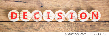 Decision word symbol. Concept word Decision on beautiful wooden circles. Beautiful wooden background. Business support help decision word concept. Copy space. Decision word symbol. Concept word Decision on beautiful wooden circles. Beautiful wooden background. Business support help decision word concept. Copy space. 137543152