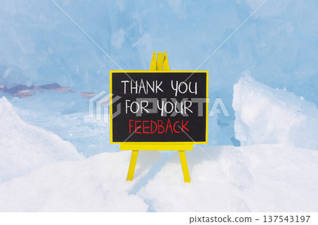 Thank you for your feedback symbol. Concept words Thank you for your feedback on beautiful blackboard. Beautiful blue Baikal ice background. Business thank you for your feedback concept. Copy space. Thank you for your feedback symbol. Concept words Thank you for your feedback on beautiful blackboard. Beautiful blue Baikal ice background. Business thank you for your feedback concept. Copy space. 137543197