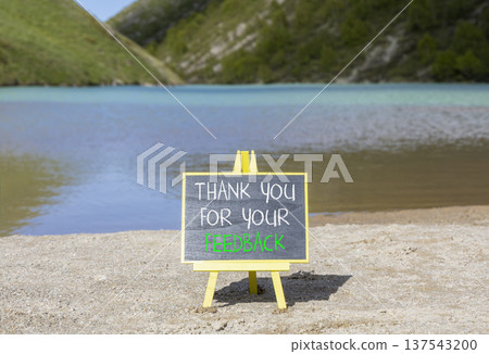Thank you for your feedback symbol. Concept words Thank you for your feedback on beautiful blackboard. Beautiful mountain lake background. Business thank you for your feedback concept. Copy space. Thank you for your feedback symbol. Concept words Thank you for your feedback on beautiful blackboard. Beautiful mountain lake background. Business thank you for your feedback concept. Copy space. 137543200