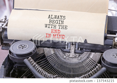 Begin with the end in mind symbol. Concept words Always begin with the end in mind typed on old retro typewriter. Beautiful white background. Business begin with the end in mind concept. Copy space. 137543215