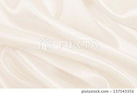 Smooth elegant golden silk or satin luxury cloth texture as wedding background. Luxurious background design. In Sepia toned. Retro style Smooth elegant golden silk or satin luxury cloth texture as wedding background. Luxurious background design. In Sepia toned. Retro style 137543358