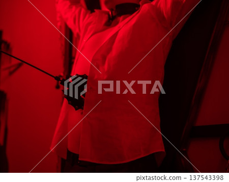 A woman dominates a man during role-playing games. A woman dominates a man during role-playing games. 137543398