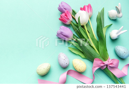 Easter tulips bouquet with eggs and bunnies on pastel background Easter tulips bouquet with eggs and bunnies on pastel background 137543441