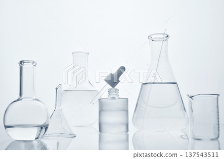 Laboratory research glassware preparing cosmetic or medical liquid Laboratory research glassware preparing cosmetic or medical liquid 137543511