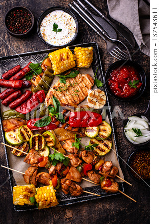 Assortment of grilled bbq meat and vegetables Assortment of grilled bbq meat and vegetables 137543611
