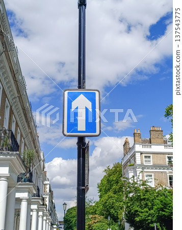 One Way Road Sign on City Street in London One Way Road Sign on City Street in London 137543775