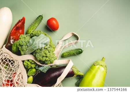 Mesh bag with organic vegetables Mesh bag with organic vegetables 137544166