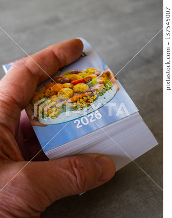 Hand Holding 2026 Calendar Block Close Up Planning Future Dates and Time Management Concept Hand Holding 2026 Calendar Block Close Up Planning Future Dates and Time Management Concept 137545007