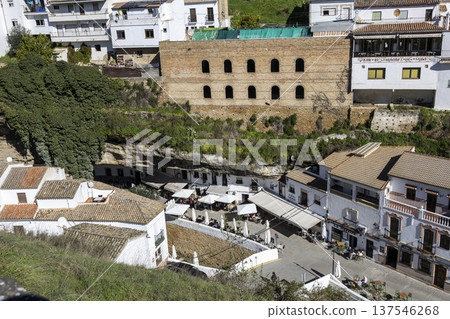 Exploring the narrow streets and unique architecture of Setenil de las Bodegas in Spain during a sunny day 137546268