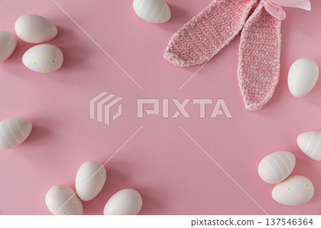 Easter Eggs with Bunny Ears on Pink Background. Spring Holiday Composition Easter Eggs with Bunny Ears on Pink Background. Spring Holiday Composition 137546364