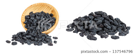 black raisins in wooden bowl isolated on white background black raisins in wooden bowl isolated on white background 137546796