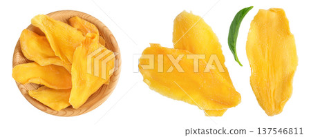 dried mango in wooden bowl isolated on white background. Top view. Flat lay dried mango in wooden bowl isolated on white background. Top view. Flat lay 137546811