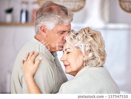 Hug, support and forehead kiss by senior couple with love, security and comfort in their home. Romance, retirement and elderly man embrace old woman with soulmate, connection and intimacy in a house Hug, support and forehead kiss by senior couple with love, security and comfort in their home. Romance, retirement and elderly man embrace old woman with soulmate, connection and intimacy in a house 137547538
