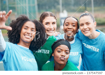 Volunteer, woman and portrait for charity and community support on netball field with diversity and smile. Happiness, people and teamwork for ngo project, solidarity and mission outdoor in nature Volunteer, woman and portrait for charity and community support on netball field with diversity and smile. Happiness, people and teamwork for ngo project, solidarity and mission outdoor in nature 137547597