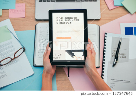 Tablet, screen and hands, business website and paperwork, company proposal and workspace. Person at desk, corporate development and digital market research strategy, sticky note and ideas top view 137547645