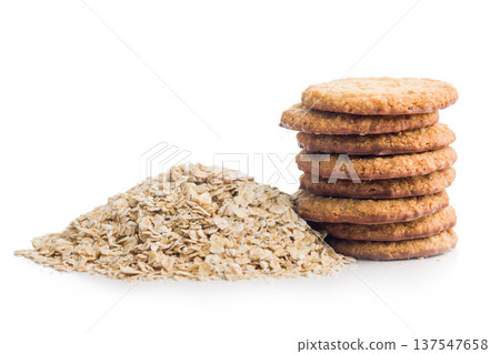 Oatmeal Cookies With Rolled Oats On White Background. Homemade Crunchy Breakfast Snack 137547658