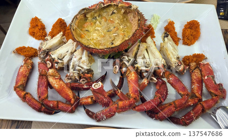 Gourmet presentation of cooked spider crab for an exquisite seafood experience Gourmet presentation of cooked spider crab for an exquisite seafood experience 137547686