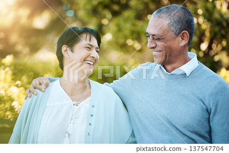 Love, smile and senior couple in park laughing for comic, comedy or funny joke in conversation. Happy, nature and elderly man and woman in retirement talking, bonding and having fun together in field 137547704
