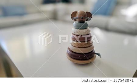 Wooden animal stacking toy on table for educational play and home decor Wooden animal stacking toy on table for educational play and home decor 137548071