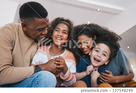 Family, parents and children on sofa with smile for bonding, healthy relationship and love. Home, living room and happy mother, father and kids laughing together for happiness, joy and relax on couch 137548249