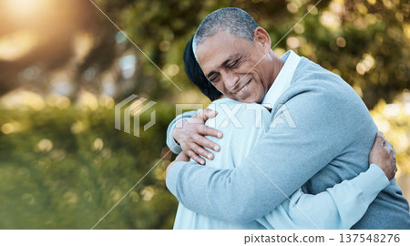 Love, nature and senior couple hugging in park for care, romance or comfort on an outdoor date. Smile, happy and elderly man and woman in retirement embracing for bonding in a green garden having fun Love, nature and senior couple hugging in park for care, romance or comfort on an outdoor date. Smile, happy and elderly man and woman in retirement embracing for bonding in a green garden having fun 137548276