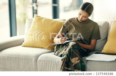Military, woman and writing on document for therapy, doctor and health information for insurance, paperwork and form survey. Soldier, healthcare and veteran in counseling, office or medical checklist 137548386