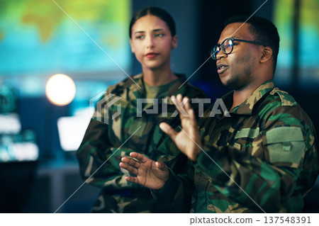 Night, talking and people in army with a strategy, cyber security or military communication. Data center, war and a black man speaking to a woman about government secret, surveillance or system 137548391