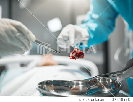 Healthcare, surgery tools and doctor hands in theatre for operation, emergency or risk with safety ppe at hospital. Medical, wellness and surgeon or professional nurse with metal equipment for help 137548558