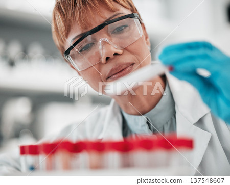 Science, medical and woman with research, test tube and glasses with vaccine development, sample and healthcare. Worker, scientist or person with analysis, experiment and cure with results or eyewear Science, medical and woman with research, test tube and glasses with vaccine development, sample and healthcare. Worker, scientist or person with analysis, experiment and cure with results or eyewear 137548607