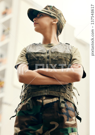 Army, thinking and arms crossed with a woman patriot in uniform for safety, surveillance or service. Military, idea and a serious young soldier looking confident or ready for battle in camouflage Army, thinking and arms crossed with a woman patriot in uniform for safety, surveillance or service. Military, idea and a serious young soldier looking confident or ready for battle in camouflage 137548617