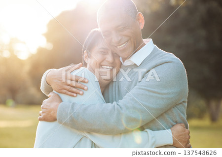 Nature, smile and senior couple hugging with love, care and romance on a date in outdoor park. Happy, laughing and elderly man and woman in retirement embracing, talking and bonding together in field Nature, smile and senior couple hugging with love, care and romance on a date in outdoor park. Happy, laughing and elderly man and woman in retirement embracing, talking and bonding together in field 137548626