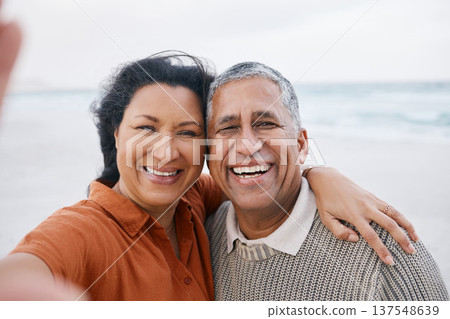 Ocean, senior or selfie portrait of happy couple with love, smile or support for a romantic bond together. Beach, old man or elderly woman taking photograph or picture memory in retirement in nature Ocean, senior or selfie portrait of happy couple with love, smile or support for a romantic bond together. Beach, old man or elderly woman taking photograph or picture memory in retirement in nature 137548639