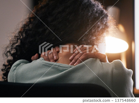 Neck pain, back and woman with stress, anxiety and work burnout in office at night. Tired, massage and muscle injury and female professional hand with tension and health problem of a worker shoulder 137548660