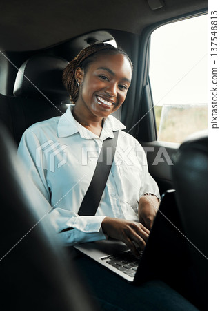 Laptop, smile and portrait of black woman in taxi to travel, typing email and remote work on internet. Computer, car and happy African person on business trip, journey and commute in transportation Laptop, smile and portrait of black woman in taxi to travel, typing email and remote work on internet. Computer, car and happy African person on business trip, journey and commute in transportation 137548813