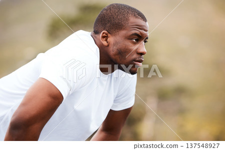 Face, fitness and an exhausted black man runner outdoor for a race, marathon or cardio training. Mindset, exercise and break with a tired young sports person in nature for a workout to improve health Face, fitness and an exhausted black man runner outdoor for a race, marathon or cardio training. Mindset, exercise and break with a tired young sports person in nature for a workout to improve health 137548927
